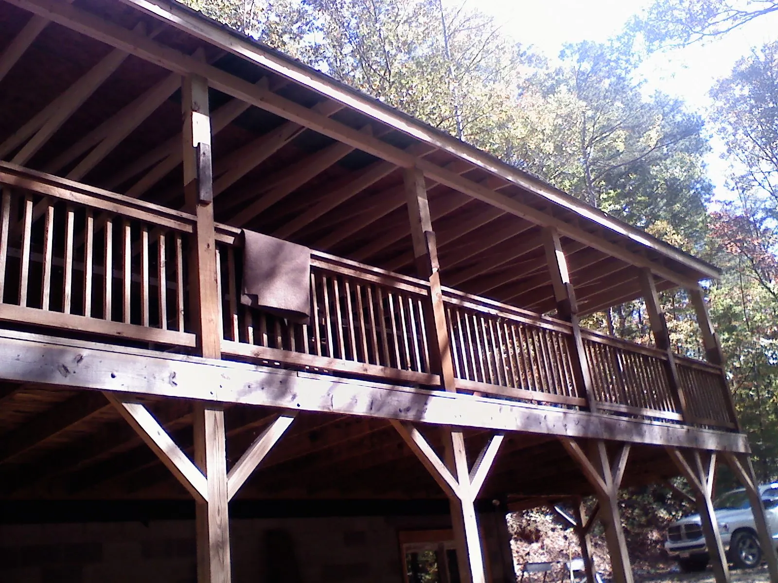 Timber framing under a new elevated porch and deck — Roof Leak Repair in Orrs Island by Roofing Brothers